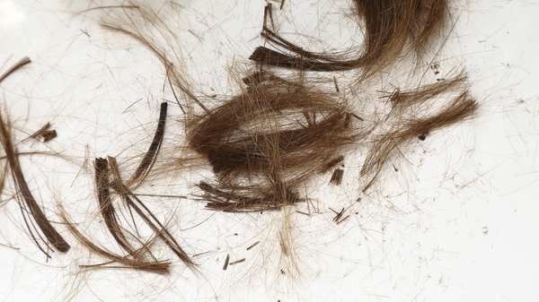 Med thumb strands of hair