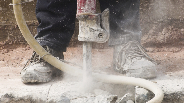 Med thumb jackhammer istock